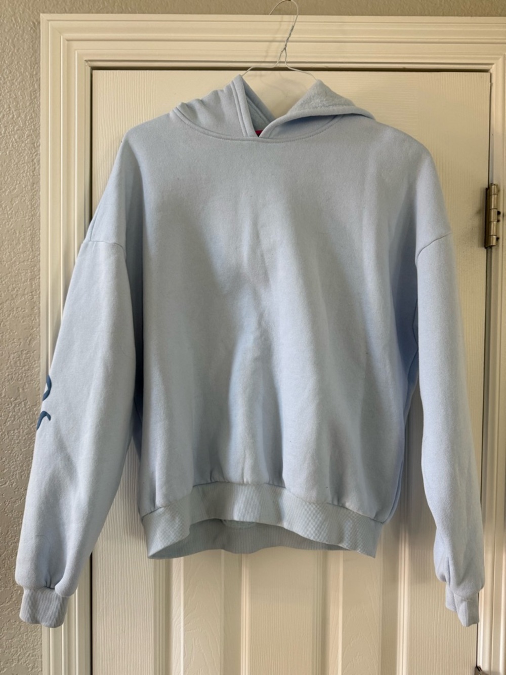 Edikted pale blue hoodie. Bow design on sleeves. Size m. Excellent condition.